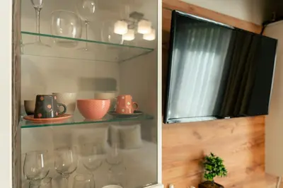 two pictures of glasses on shelves in a kitchen at Бутиково студио Joy-free parking in Plovdiv