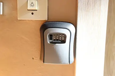 a door sensor on a wall with a light switch at Apartment Nataliya in Smolyan