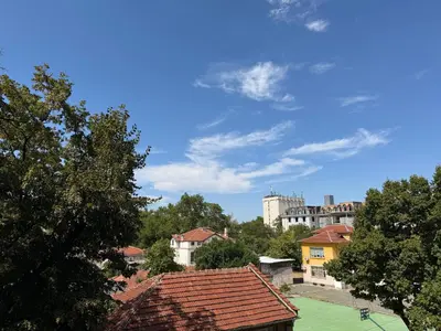 a view of a city with buildings and trees at Sun Home in the Heart of Plovdiv - Central Location - Free Private Parking in Plovdiv
