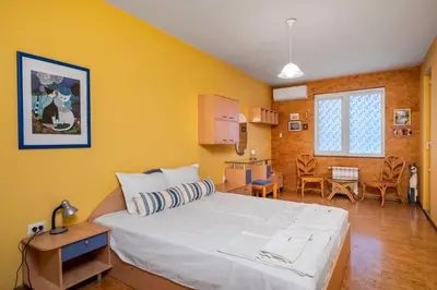 a bedroom with a large white bed in a room at Vintage and Cozy 2BD Apartment in Prime Location by Flat Mаnager in Sofia