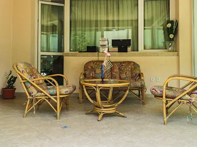 a room with a table and two chairs at АПАРТАМЕНТ ЗА ГОСТИ 