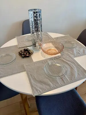 a white table with a vase on top of it at MyCampus UNWE Studentski Mountain Views Modern Kitchen Equipment in Sofia