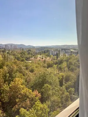 a view of a city from a window at MyCampus UNWE Studentski Mountain Views Modern Kitchen Equipment in Sofia