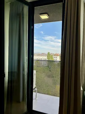 a view from a window of a balcony at MyCampus UNWE Studentski Mountain Views Modern Kitchen Equipment in Sofia