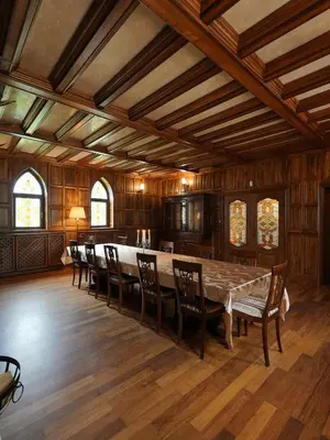 a large dining room with a large table and chairs at The Castle - Your unique way of retreat in Borovets