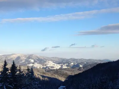 a view from the top of a snow covered mountain at Stenata Boutique Apartments in Pamporovo
