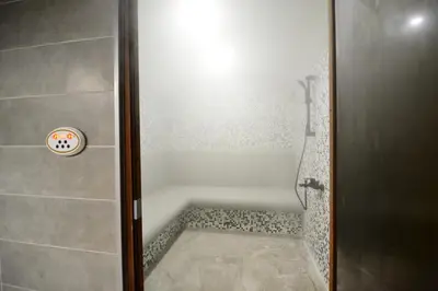 a bathroom with a shower with a shower at Hit Hot House in Sandanski