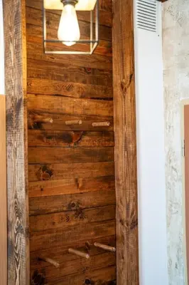 a wooden door in a room with a ceiling at Mountain Studio - Ski in and out - FREE Spa in Bansko