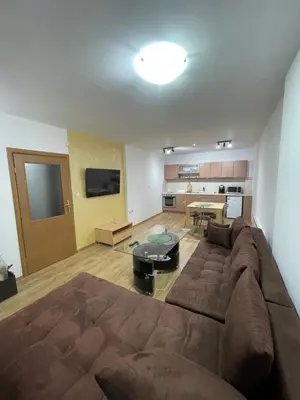 a large living room with a couch and a table at PAMPOROVO Raikovski lodge in Pamporovo