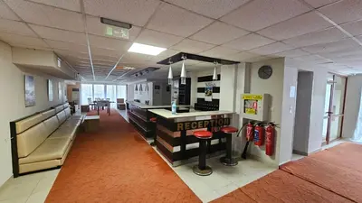 an office lobby with a reception desk and fire hydrants at ICEBERG Ski Apartment No19 in Pamporovo