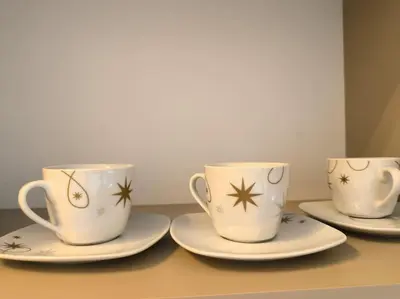 three coffee cups and saucers on a table at My Campus Studios, free parking, self-check in in Sofia