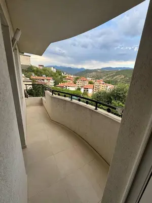 a balcony with a view of a city at Пандова къща in Sandanski