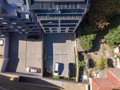 an overhead view of a parking lot with cars parked at LDV 13 Residence Free private parking in Plovdiv