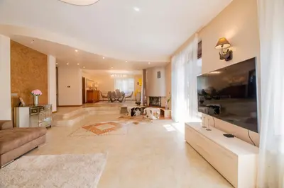 a large living room with a large flat screen tv at Villa 1331 in Zheleznitsa