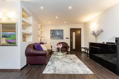 a living room with a couch and a table at Villa 1331 in Zheleznitsa