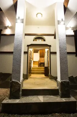 a hallway of a building with a stairway at Guest House Panorama in Gela