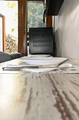 a laptop computer sitting on top of a table at Velar 1BDR Apartment in Sofia