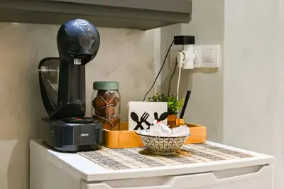 a counter top with a coffee maker and a blender at Velar 1BDR Apartment in Sofia