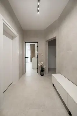 a large room with a couch and flowers in it at Top Centre Bright & Sunny Stylish Apt with 2BDR and 2BTH in Sofia
