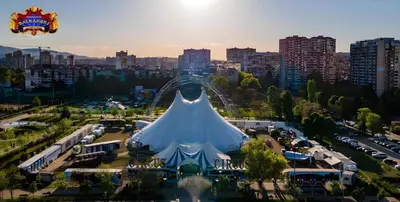 a large tent in a parking lot with a city at Central Apartment 2 in Sofia