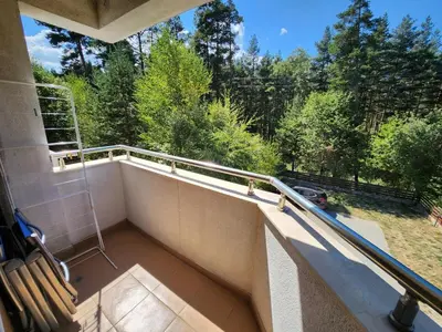 an empty balcony with a view of trees at Pine tree Easy Ski access - Next 100m to Ski slope and forest view in Bansko