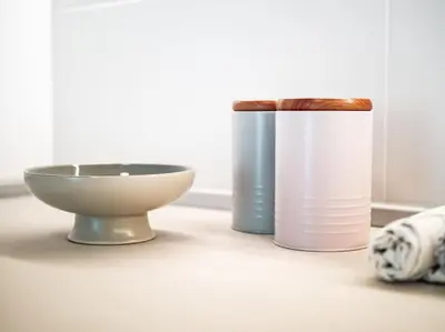 two vases and a bowl on a table at Mycampus 1 bdrm, stay 4, free parking, garden, self check-in in Sofia