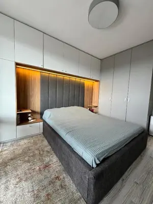a bedroom with a large bed in a room at Central Apartment with Amazing Views in Sofia