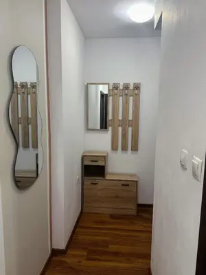 a dressing room with a mirror and a dressing table at Grace Appartament in Plovdiv