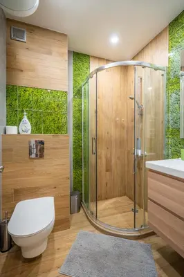 a bathroom with a shower and a toilet and a sink at Palitra Studio in Sofia