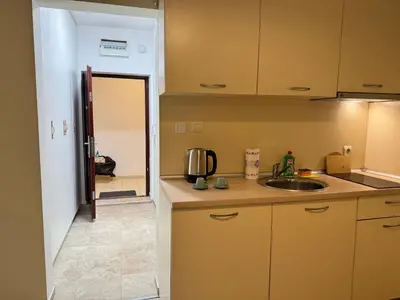 a kitchen with a sink and a counter top at Studio 108 by COSHER in Sofia