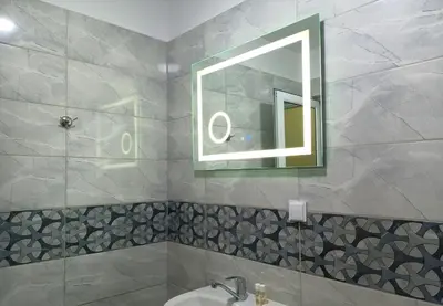 a bathroom with a sink and a mirror at Ubis Hotel in Krumovo