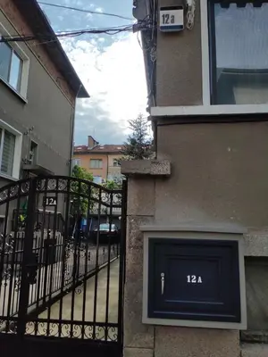 a door on a building with a sign on it at Luxury studio 12-4 in Plovdiv