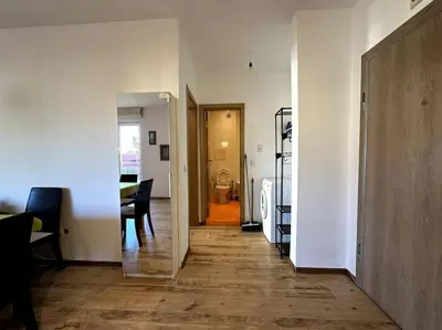 a hallway with a hallway leading to a room at Cozy flat in central Sofia in Sofia