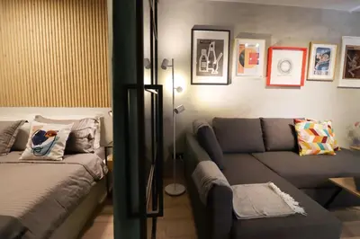 a small living room with a couch at NEW Oasis in the heart of Sofia in Sofia