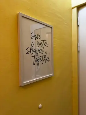 a sign on a wall that says some water shingle together at Oborishte Family Elegance with Garden View in Sofia