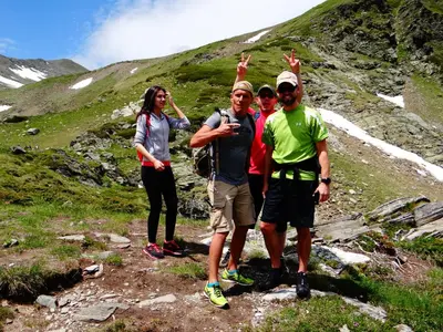 a group of three people standing on a mountain at Apartments Carrera in Sofia