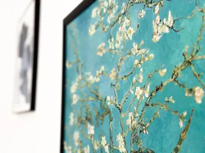 a painting with white flowers on a blue wall at Large 2-BR Retreat, Walk to Sofias Top Spots in Sofia