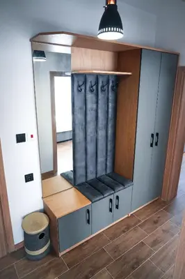 a dressing room with a mirror and a dressing cabinet at Sun City Apartment in Sandanski
