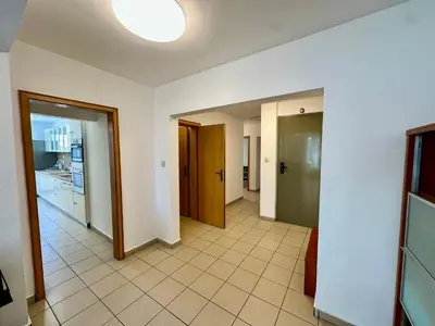 an empty room with a kitchen and a hallway at Central District 3 Bedroom Place in Plovdiv