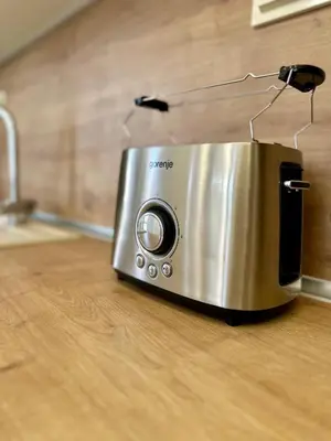 a toaster sitting on top of a kitchen counter at Central District 3 Bedroom Place in Plovdiv