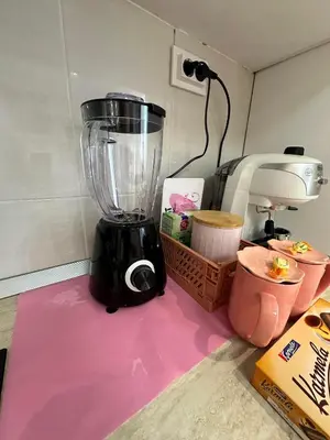 a blender sitting on top of a pink rug at Central Art Studio in Sofia