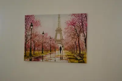 a painting of the eiffel tower on a wall at TOP Center, basement fl, 7 beds, 10min from Serdica in Sofia