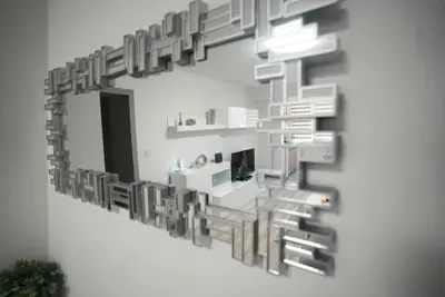 a large mirror hanging on a wall in a room at The Secret Paradise in Sofia