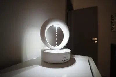a white clock sitting on top of a table at The Secret Paradise in Sofia