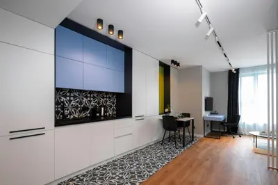 a living room with a large flat screen tv on a wall at Aviva Living by Flat Mаnager in Sofia