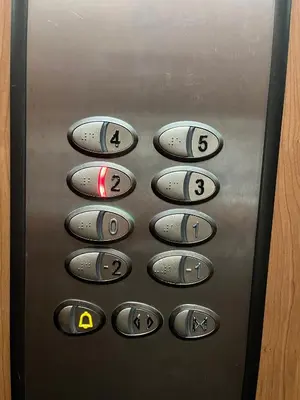 a close up of a control panel of an elevator at FREESIA apartment with underground parking in Sofia
