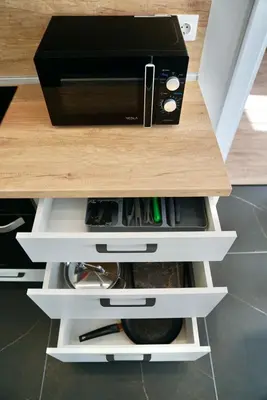 a drawer with a box on top of a counter at AveNew Luxury Apartment 3 in Sofia