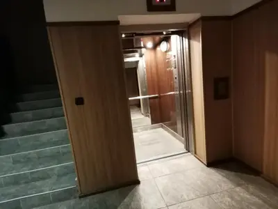 an open door to a hallway with a glass door at ТОП Локация и УЮТ in Bansko