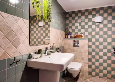a bathroom with a sink and a toilet at Къща за гости Casa La Tinozza in Hisarya