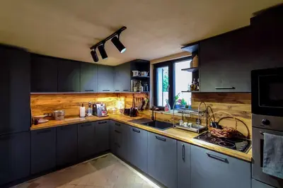 a kitchen with a sink and a counter top at Къща за гости Casa La Tinozza in Hisarya